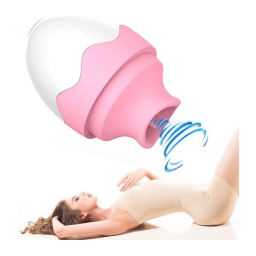 Contoured clitoral vibrator